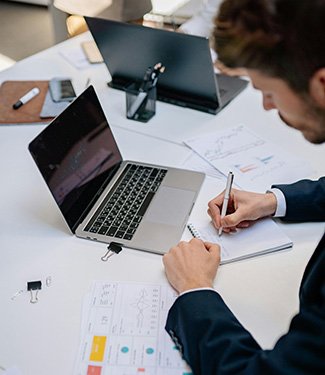 web designer taking notes